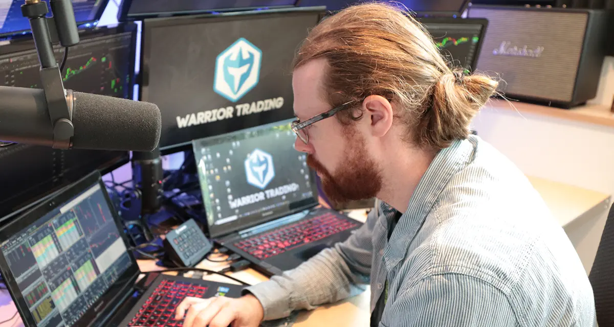 Image of Ross sitting at his trading station