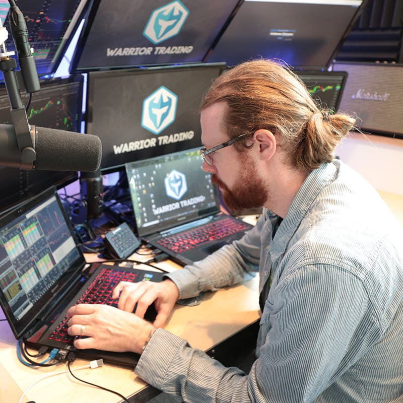 Image of Ross sitting at his trading station